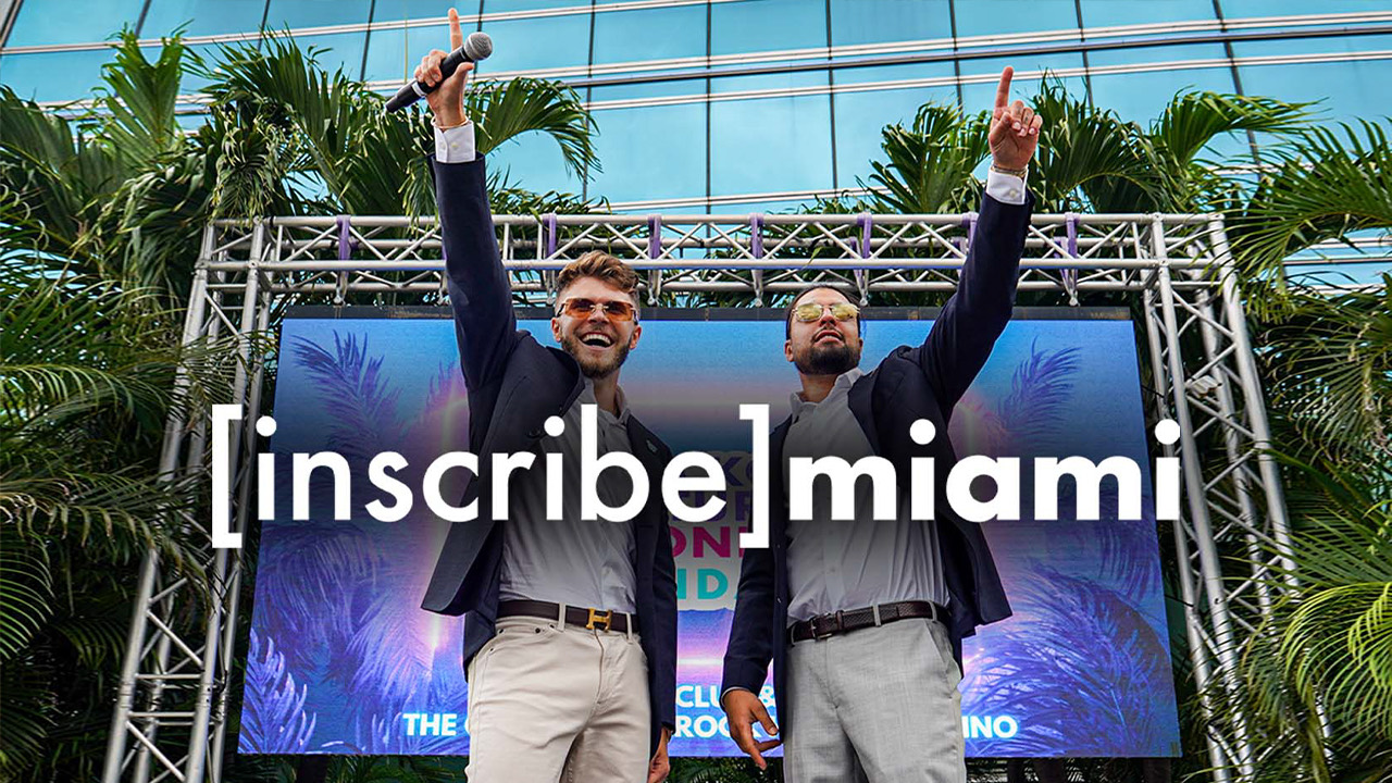 Christian Barker (Bark) on stage at Inscribe Miami crypto event