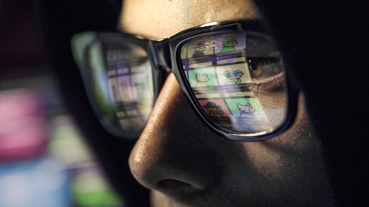 Eyeglasses reflecting a marketplace grid of colorful Doginal Dogs pixel NFTs